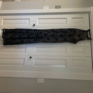 Long mermaid style formal dress. Size M black with nude underlay